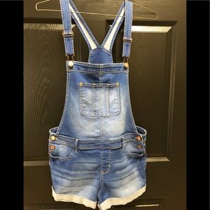 Juniors size Large 11/13 denim overalls.